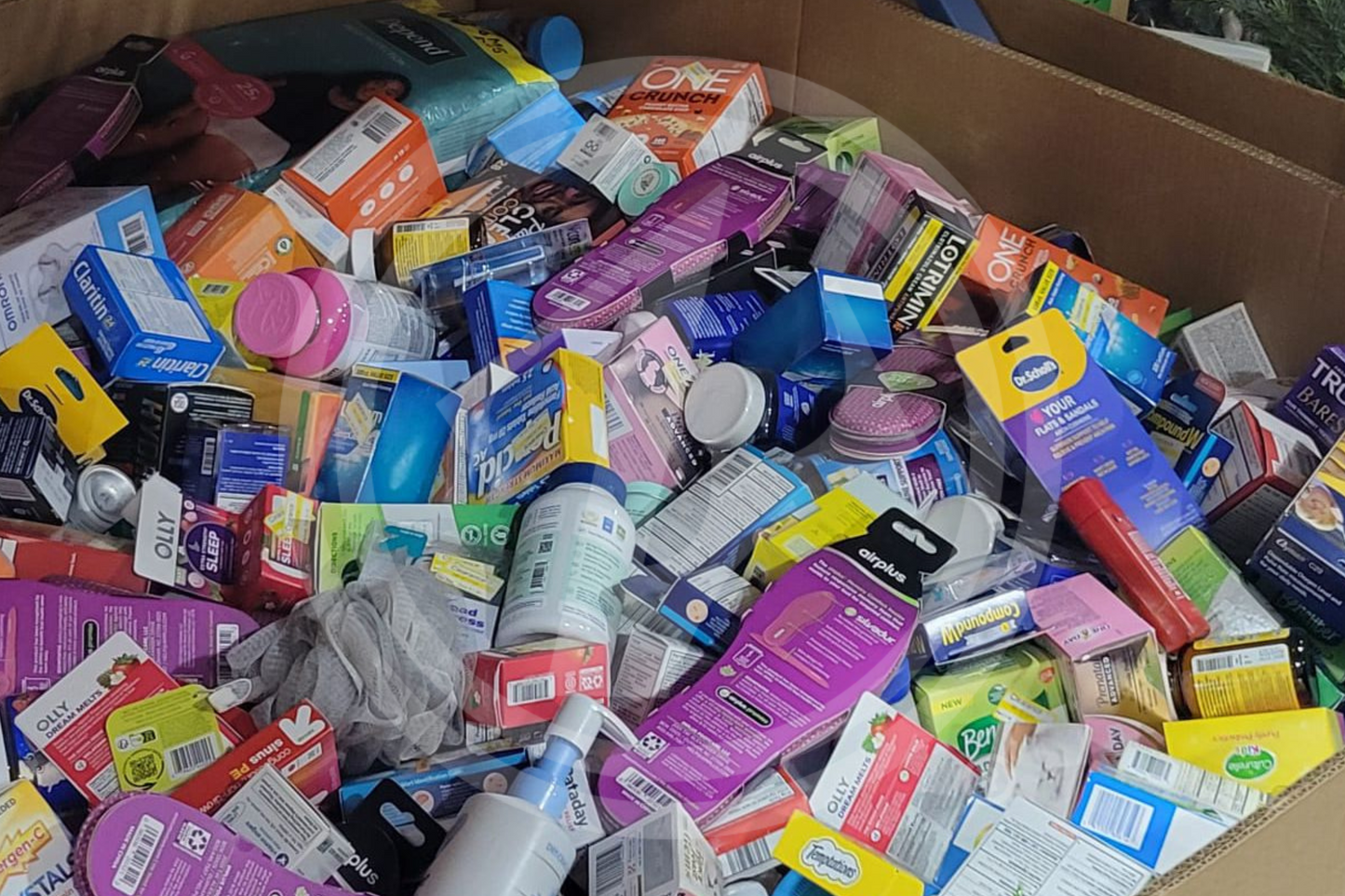 Purchase TGT Health and Beauty truckloads featuring a mix of cosmetics, vitamins, supplements, and body wash from Zapps Wholesale.