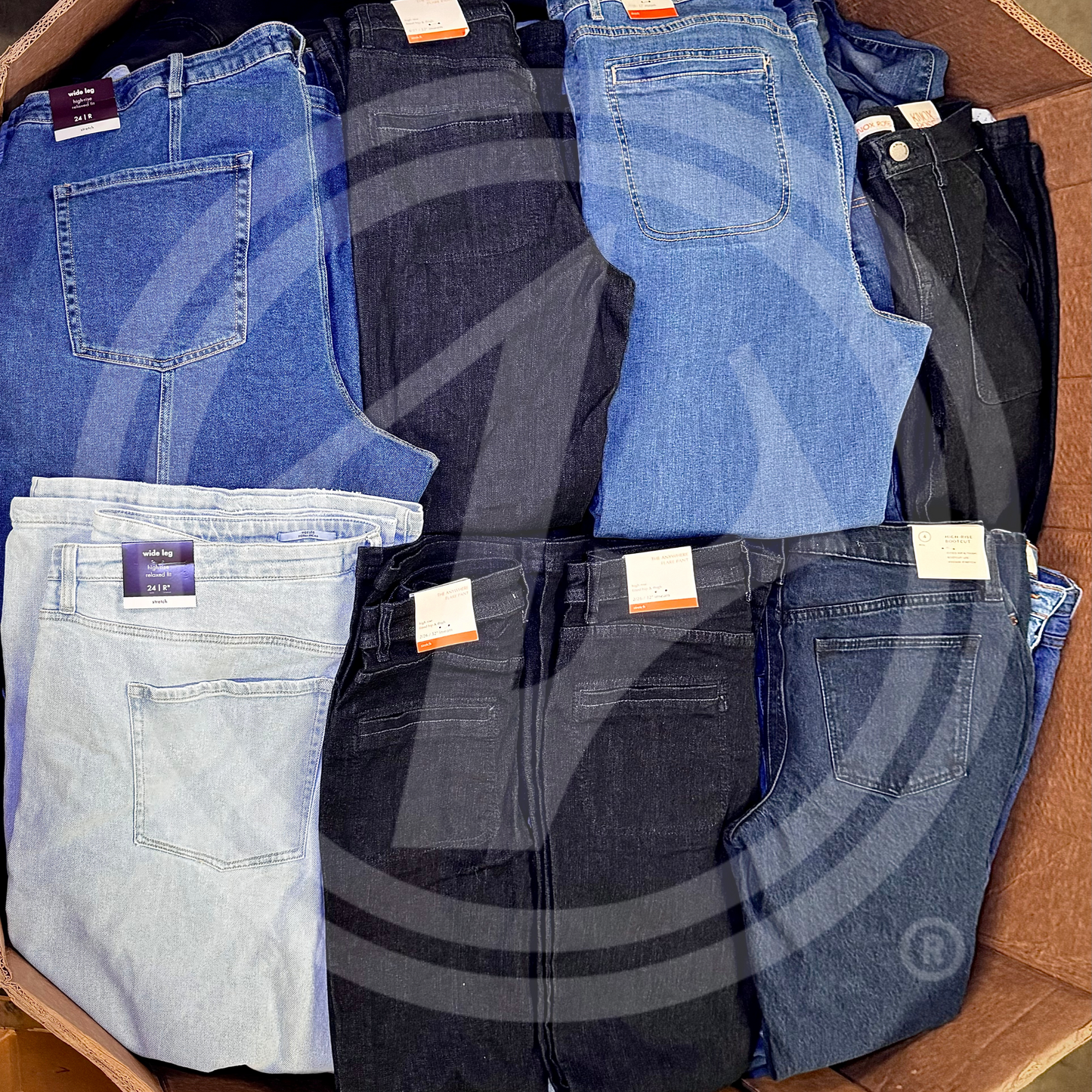 Purchase TGT jeans truckloads featuring a mix of men's, women's, and kids' jeans from Zapps Wholesale.